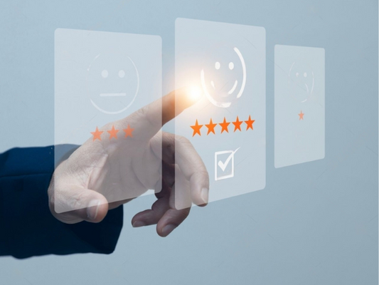 Customer review good rating concept, people use laptop with popup of smile face and five star on visual screen for positive customer feedback testimonial