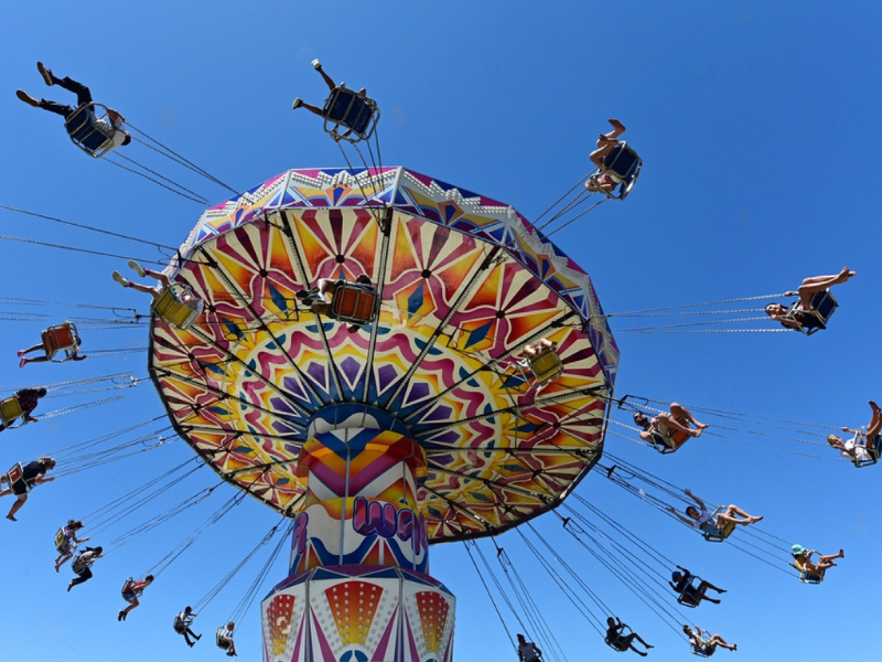 Swingers taking a ride at the carnival